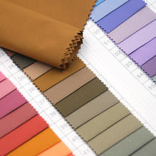 Vêtements de travail Tissu de tissu largement utilisé et haute densité 100% polyester Twill Gabardine