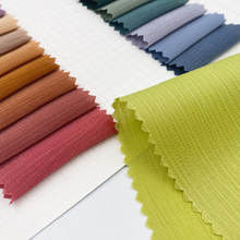 Vêtements de travail Tissu de tissu largement utilisé et haute densité 100% polyester Twill Gabardine