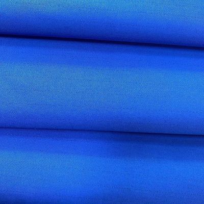 Fabrication à partir de tissus de toile pour le processus de fabrication de vêtements de travail