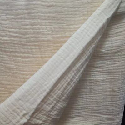 Finition à crêpes 100% coton muslin Tissu de gaze pour couverture de bébé et pyjama style solide